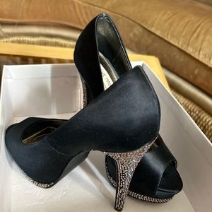 Black Satin 5” comfy heels.  Brand new in the box.